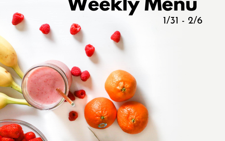 Fresh fruits surrounding a smoothie
